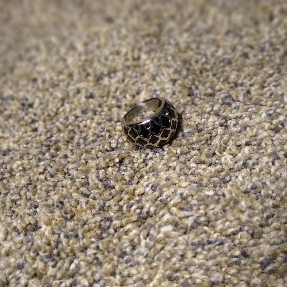 Black imprinted ring